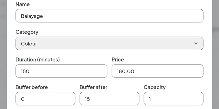 Edit-service form for Balayage: 150 minutes, price 180.00, no buffer before, 15 minutes after, and a capacity of one.