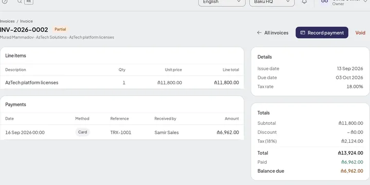 Invoice INV-2026-0002 marked Partial: its line item, 18% tax and AZN totals, and a card payment posted against it leaving the balance due.